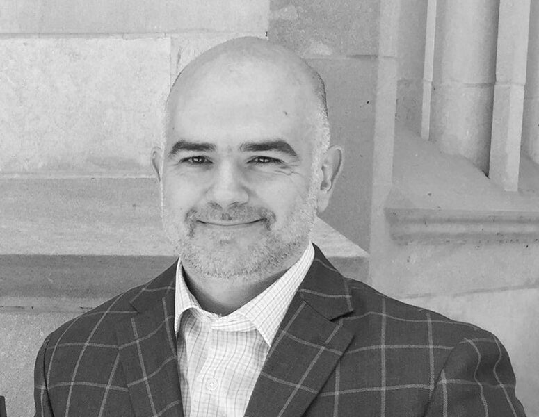 Black and white photo portrait of architect Mike Thompson.